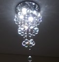Ver imagem 4 de Lustre de Cristal Torre, Base de Inox 30cm de Diâmetro com 40cm de Altura, Para Sala de Jantar/Estar