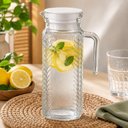 Ver imagem 1 de Jarra Firenze Vidro com Tampa Plastica Branca para Agua e Suco Decorada Porta Geladeira Incolor 1L