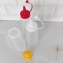 Ver mais imagens de 10 Bisnagas Plásticas Flexível para Lanchonetes Frascos de Molhos Ketchup Bico Vermelho