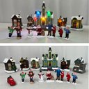 Ver imagem 2 de Vila Natalina 21 Pecas Premium Figuras de Natal Iluminacao LED Luz Loja Vitrine Decoracao Enfeites B