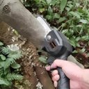 Ver imagem 5 de Mini Serra Elétrica Portátil Recarregável com 2 Baterias 48v