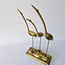 Ver mais imagens de Escultura Decorativa Trio Garças em Resina - Alt. 41cm X Larg. 14cm X Comp. 27cm