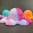 Ver imagem 6 de Chaveiro Polvo Reversível Pop It Fidget Toy Brinquedo Anti Stress Apertar TikTok Silicone Sensorial 