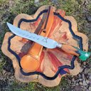 Ver mais imagens de Faca Artesanal Forjada Integral Churrasco Pena Folha Inox 420c Cabo Híbrido Madeira e Resina Verde