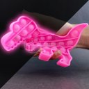 Ver imagem 2 de Pop It Brilha no Escuro Fluorescente Dinossauro Fidget Toy Brinquedo Anti Stress Sensorial - Rosa