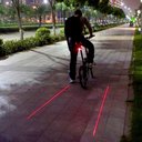 Ver imagem 6 de Lanterna Traseira para Bike Led Potente Sinalização Segura Efeito no Chão e Design Impermeável